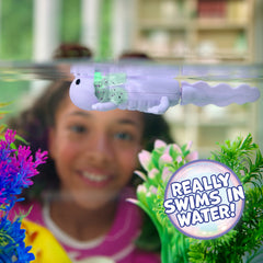 Fingerlings Interactive Baby Axolotl, Auggie (Purple), Swims & Lights Up
